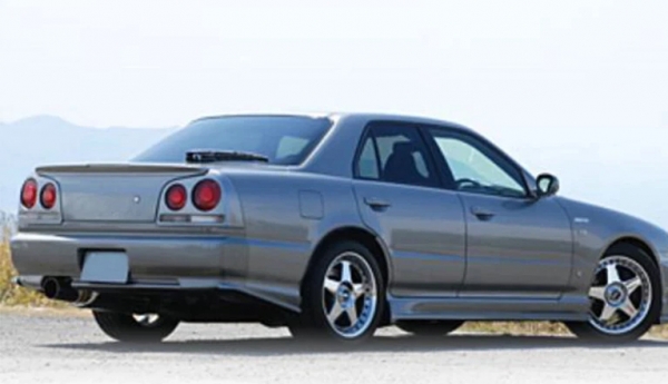 Nissan R34 4dr HSM Style Spat Extensions Rear Bumper